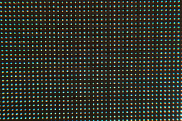 stock image Large RGB LED screen panel texture with bokeh for wallpaper background