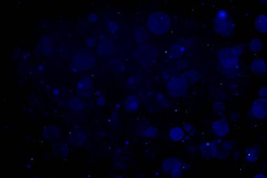 Siyah arka plan ile Soyut Mavi bokeh