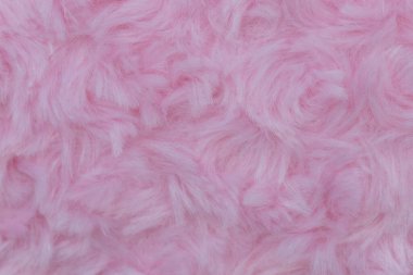 Pembe lüks yün doğal tüylü kürk derisi arka plan ve duvar kağıdı için yakın çekim dokusu