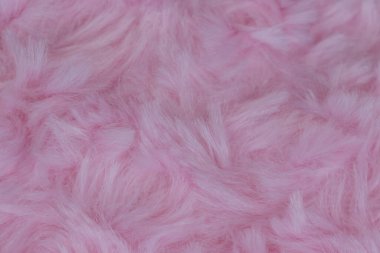 Pembe lüks yün doğal tüylü kürk derisi arka plan ve duvar kağıdı için yakın çekim dokusu