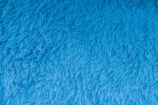 Blue faux fur rug texture use for background