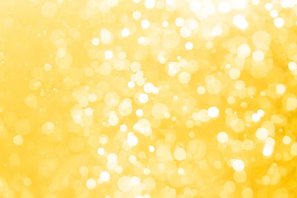 背景に水の中の光から黄金のボケ — ストック写真
