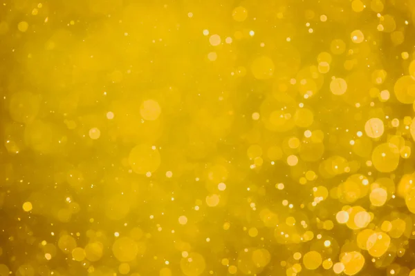 Abstract blur gold bokeh circles use for colorful art and design background