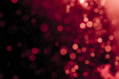 Soyut dekorasyon Bokeh bayramında siyah arka planda parlayan ışıklar