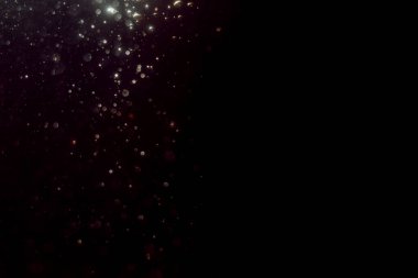 Soyut glitter bokeh siyah arka plan üzerine