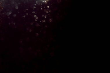 Soyut glitter bokeh siyah arka plan üzerine