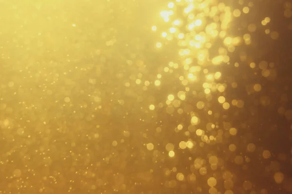 Stock image Glittering stars of blur gold  bokeh use for celebrate background