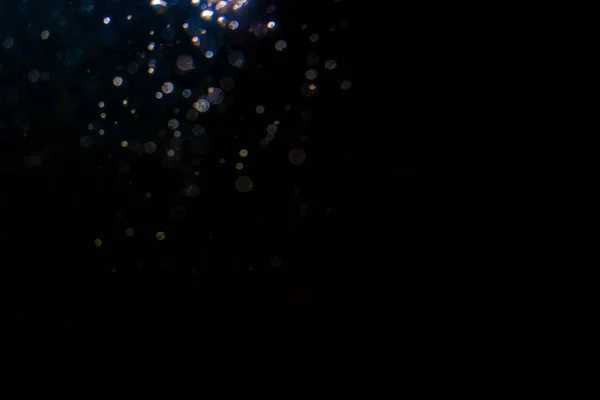 ブラックを背景にしたライトのボケ — ストック写真