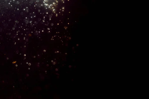 Soyut Glitter Bokeh Siyah Arka Plan Üzerine — Stok fotoğraf