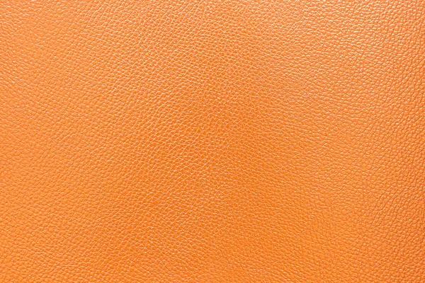 オレンジ革の柄の質感の背景 — ストック写真