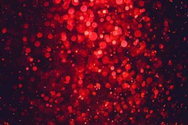 Siyah arkaplanda kırmızı ışık bokeh