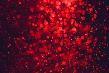 Siyah arkaplanda kırmızı ışık bokeh