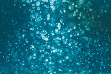 Kutlama arka planı için Bokeh 'in ışıldayan yıldızları