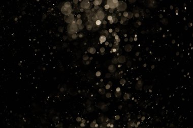 Siyah arkaplan ile neon ışıkları tarafından oluşturulan klasik siyah bokeh