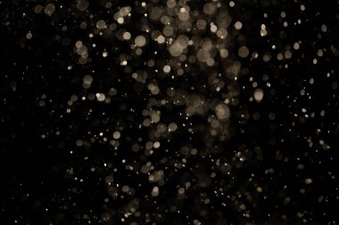 Siyah arkaplan ile neon ışıkları tarafından oluşturulan klasik siyah bokeh