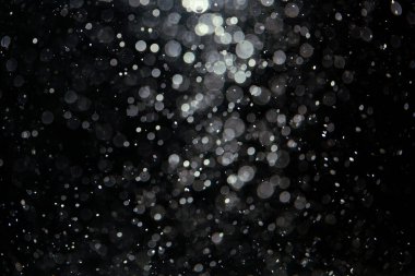 Siyah arkaplanda siyah bokeh dokusu