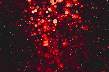 Siyah arkaplanda kırmızı ışık bokeh