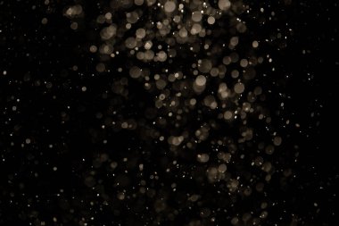 Siyah arkaplan ile neon ışıkları tarafından oluşturulan klasik siyah bokeh