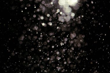 Siyah arkaplanda siyah bokeh dokusu