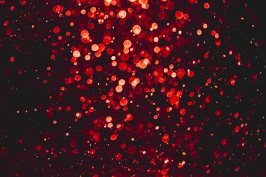 Siyah arkaplanda kırmızı ışık bokeh