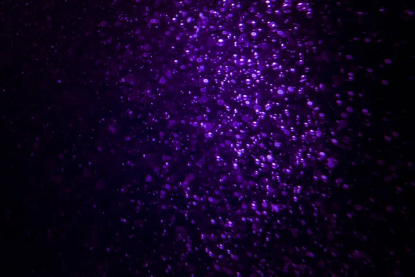 stock image Purple bokeh abstract background caused by spray water for valentine'day