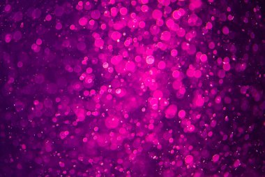 Siyah arkaplanda mor bokeh dokusu