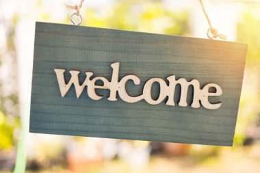 Welcome sign Invitation concept with nature background clipart