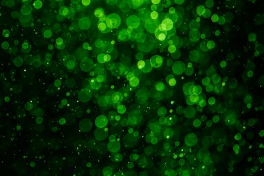 Siyah arkaplan ile soyut yeşil bokeh