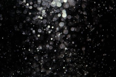 Siyah arkaplanda siyah bokeh dokusu