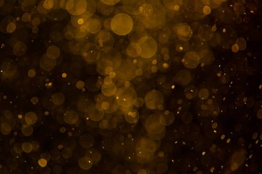 Siyah arkaplan ile altın soyut bokeh