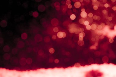 Soyut dekorasyon Bokeh bayramında siyah arka planda parlayan ışıklar