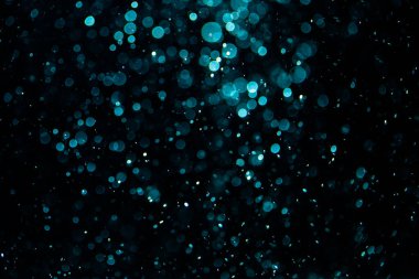 Siyah arkaplan ile neon ışıkları tarafından oluşturulan klasik siyah bokeh
