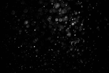 Siyah arkaplanda ışık bokeh