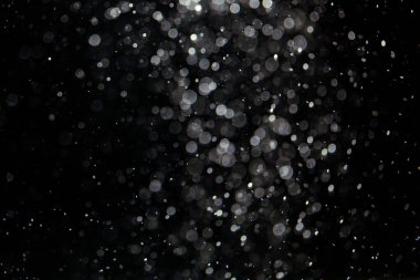 Siyah arkaplanda siyah bokeh dokusu