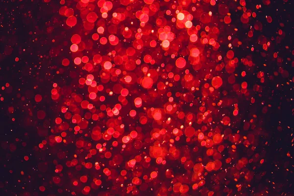Siyah arkaplanda kırmızı ışık bokeh