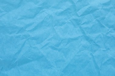 Kırışıklık arkaplanı olan mavi kağıt