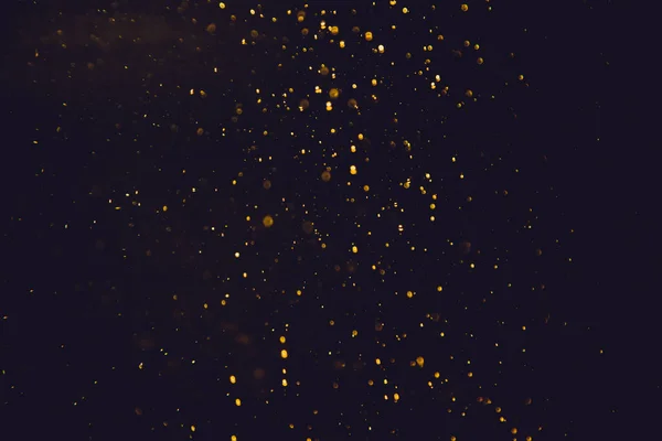 Golden Bokeh Lights Black Background — Stock Photo, Image