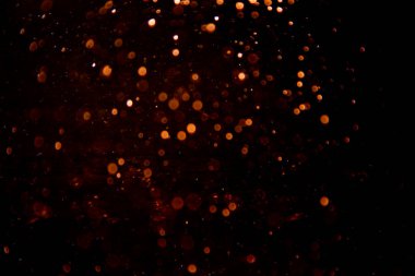 Siyah arkaplan ile soyut altın bokeh