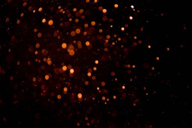 Siyah arkaplan ile soyut altın bokeh