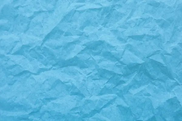 Blue paper with wrinkles texture background
