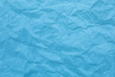 Kırışıklık arkaplanı olan mavi kağıt
