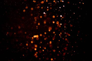 Siyah arkaplan ile soyut altın bokeh