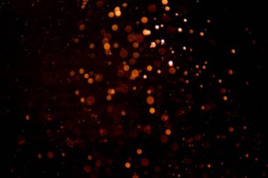 Siyah arkaplan ile soyut altın bokeh