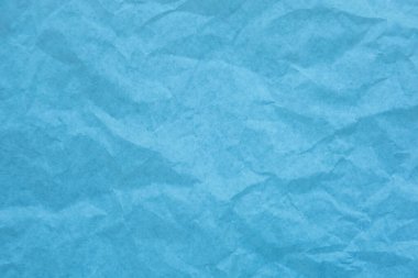 Kırışıklık arkaplanı olan mavi kağıt