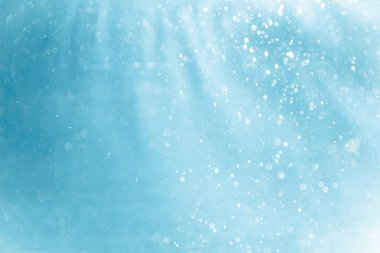 Doğal su dokusundan mavi bokeh