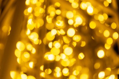 Sevgililer Günü için siyah arkaplanı olan soyut altın bokeh