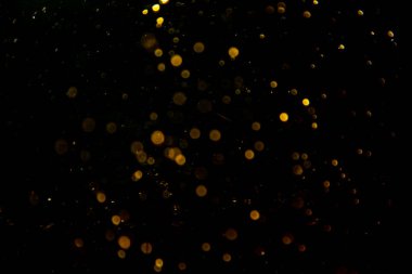 Siyah arkaplan ile klasik Altın soyut bokeh