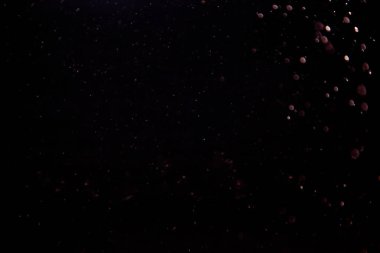 Siyah arkaplan üzerindeki ışık deseninin soyut bokeh 'i