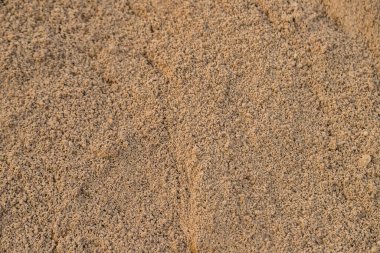 İnşaat dokusu arkaplanı için kum yığını