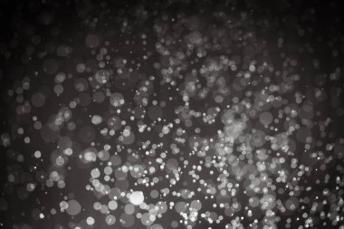 Siyah arkaplanı olan soyut siyah bokeh